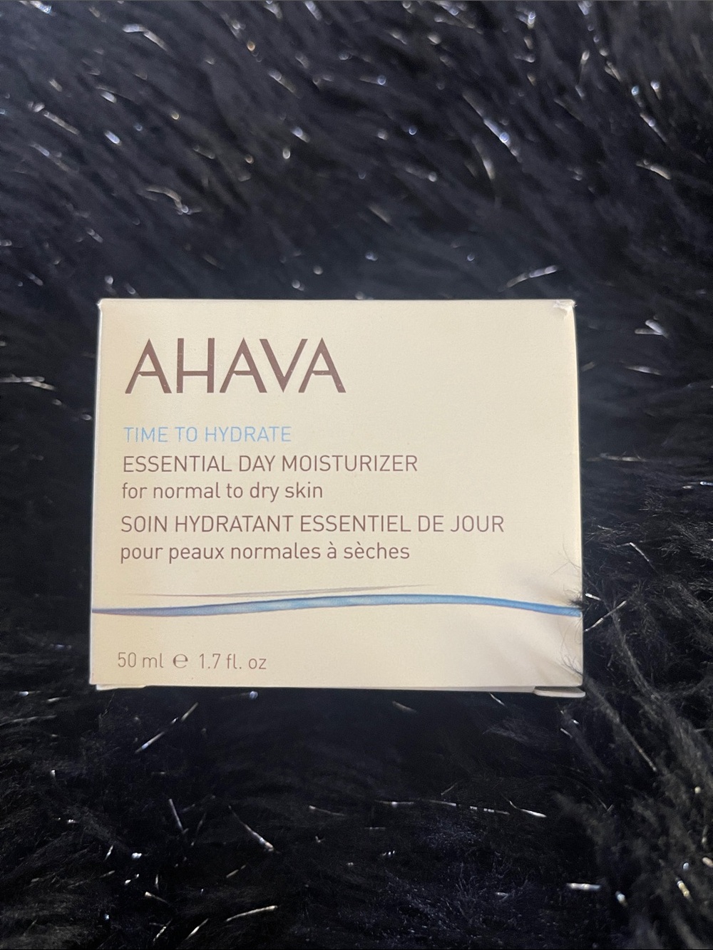AHAVA Day Moisturizer in Cream with Blue Accent